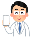 スマートフォンを持つ医者